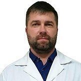 Врач Бреев Денис Михайлович
